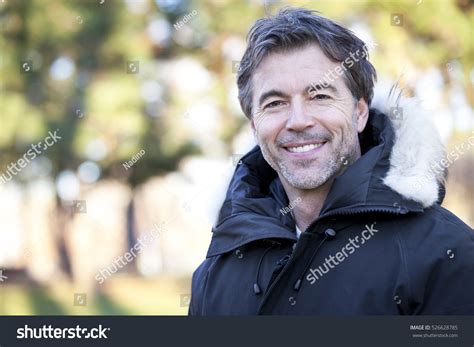 Handsome Mature Happy Man Smiling Cameraoutside Stock Photo 526628785