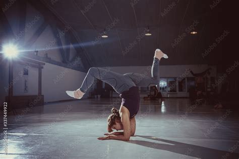 young attractive woman practicing yoga  studio girl standing
