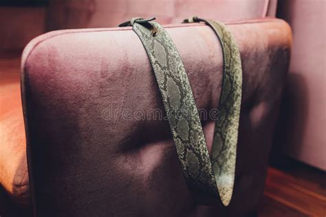 A Man Watches An Adult Video On A Laptop While Sitting On The Couch The Concept Of Porn