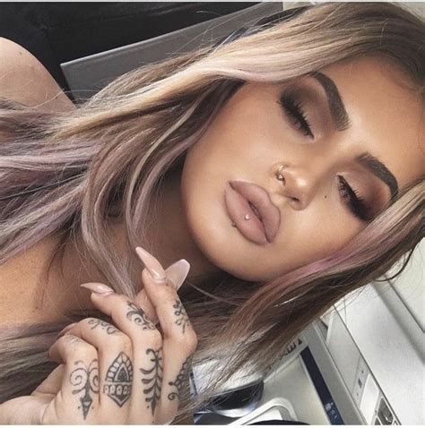 Horizontal Lip Piercing Blonde Woman With Tattoos On Her Hand Nude Matte Lip Gloss Long