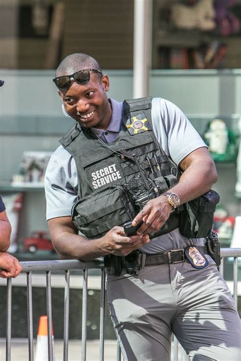 Secret Service Agent Looking at His Phone Editorial Photo - Image of ...