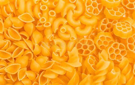 Variety Of Types And Shapes Of Italian Pasta On The Table Top View