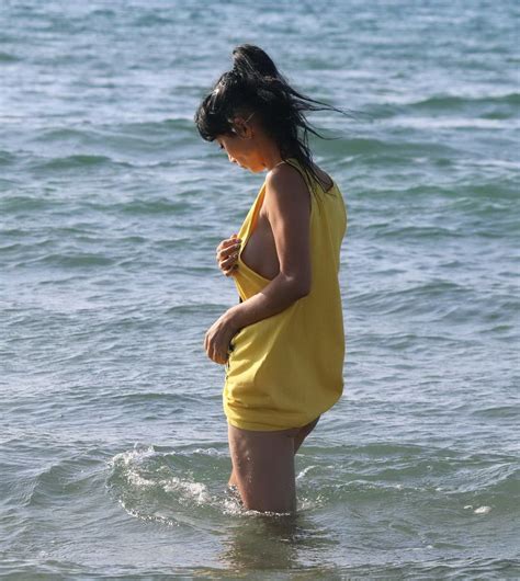 Bai Ling Shows Sideboob And Pokies In Wet Tshirt And Bikini Bottom At The Beach Porn Pictures