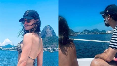 De biquíni Alinne Moraes surge em fotos raras o marido e o filho