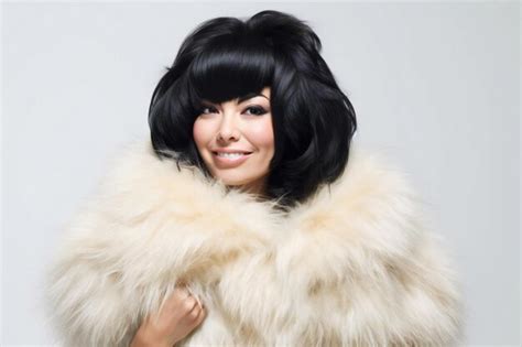 Premium AI Image Portrait Of A Beautiful Brunette Woman In A White Fur Coat