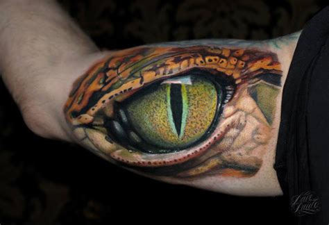 Reptile Eye Inner Bicep | Best tattoo design ideas