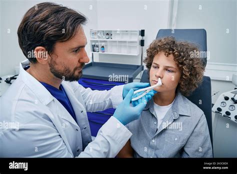 ent  nasal speculum  rhinoscope  examine child patients nose