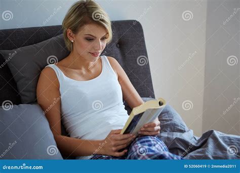 Blonde Woman Reading A Book Stock Image Image Of Attractive Bedroom