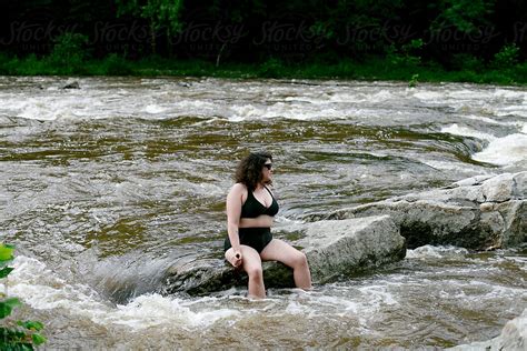 Woman In Bikini In River By Stocksy Contributor Jennifer Brister