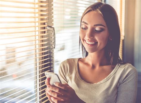 Premium Photo Beautiful Young Business Lady Is Using A Smartphone