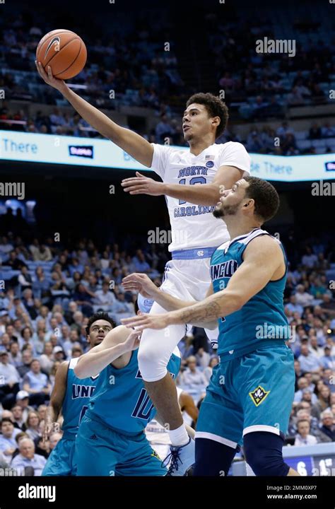 North Carolinas Cameron Johnson 13 Drives To The Basket Against Unc