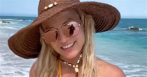 Britney Spears Sizzles In Tiny Yellow Bikini As She Enjoys Beach Getaway With Hubby Daily Star