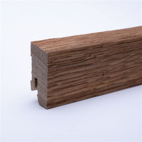 Plinthe en bois véritable avec à bord biseauté 40 mm chêne huilé Bord