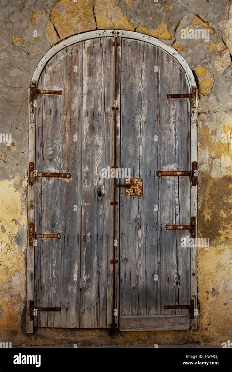 Old Worn Wooden Arched Doorway Stock Photo Alamy