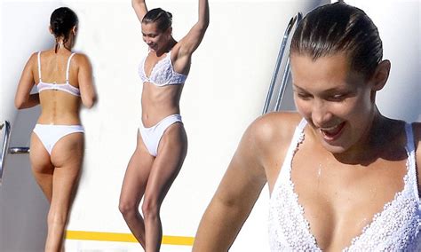 Bella Hadid Grapples With Thong Bikini During Cannes Trip Daily Mail Online