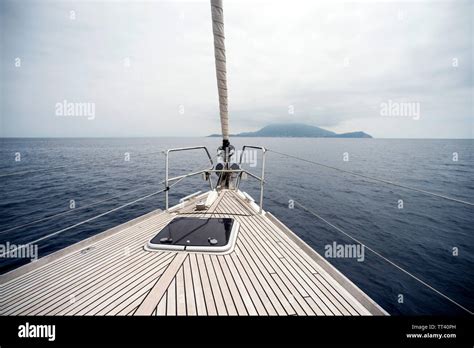 Bow Of Sailing Yacht With Land In Sight Stock Photo Alamy