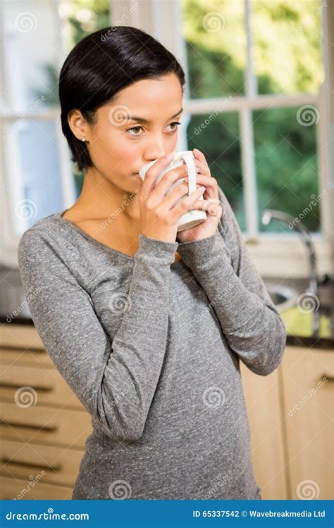 Attractive Brunette Drinking By White Cup Stock Photo Image Of Homey Beautiful 65337542