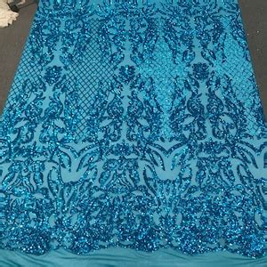 Turquoise Shiny Sequin Damask Design Embroidery On A Way Stretch Mesh