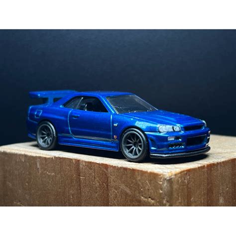KentNgoShop Xe Mô Hình Hot Wheels Premium Nissan Skyline R tỉ lệ đã qua sử dụng