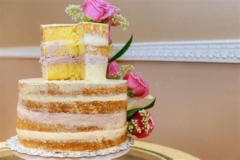 Yellow Layer Naked Cake Decorated With Pink Roses Cut Top Layer Stock Image Image Of