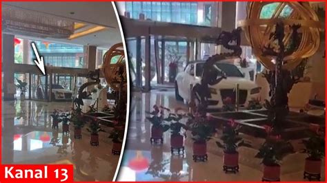 Angry Hotel Guest Smashes Car Into Shanghai Hotel Youtube