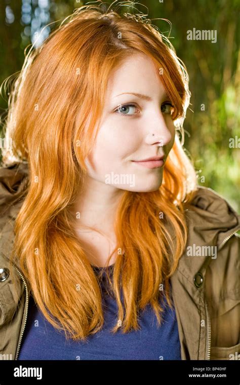 Beautiful Redhead Teen Posing For The Camera With A Cute Smile Stock