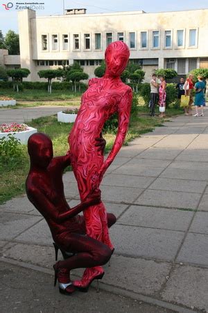 Two Horny Red Zentai Wearing Chick Exposing XXX Dessert Picture