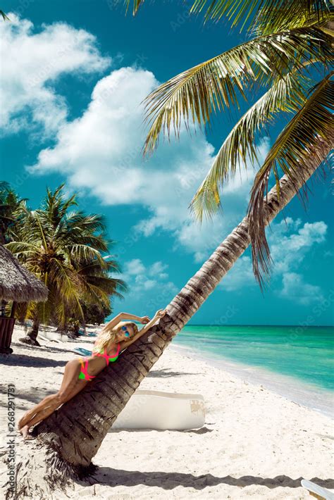 Beautiful Sexy Woman In Bikini Posing On The Caribbean Beach Stock Photo Adobe Stock