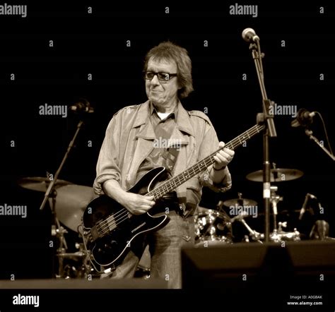 Bill Wyman Playing Electric Bass Guitar Guitarist Stock Photo Alamy