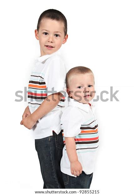 Brothers Standing Together Back Back On Stock Photo 92855215 Shutterstock