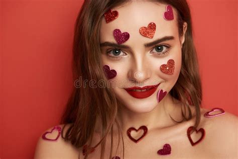 Pretty Naked Brunette Girl Is Decorated With Heart Shaped Stickers Indoors Image Stock Image