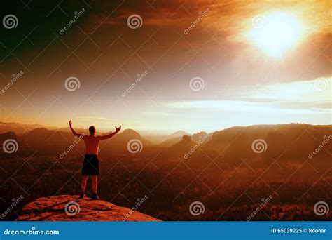Red Filter Photo Naked Climber In Black Pants Gesture Of Triumph Tourist On Peak Of Sandstone