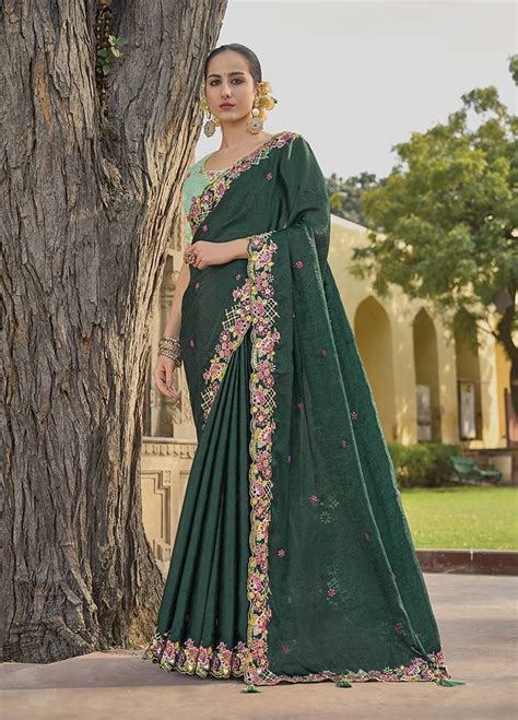 dark green colour embroidered organza silk saree monjolika