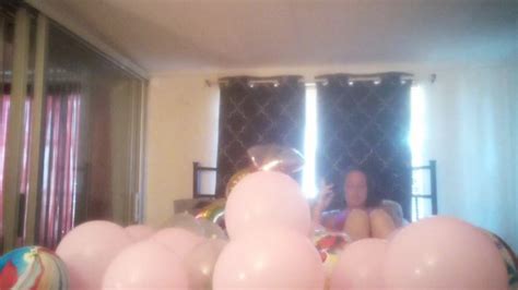 Milf With Extreme Long Hair Popping Balloons And Smoking Cigarettes While Filming Up Her Own