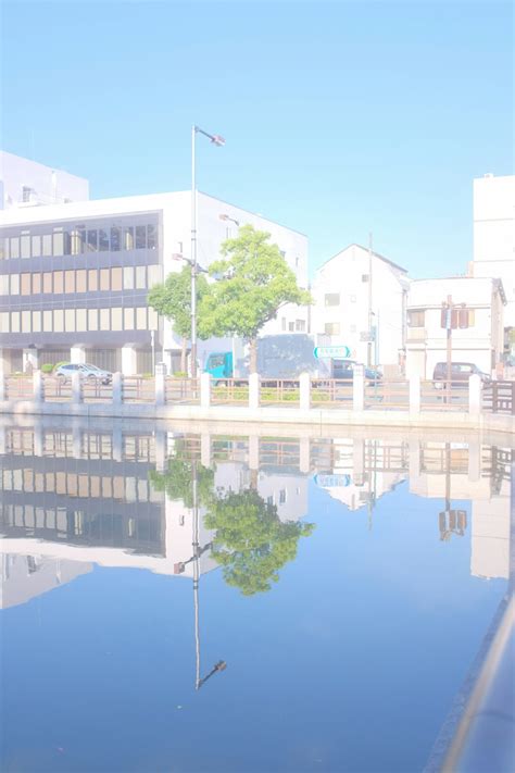 White Concrete Building Near Body Of Water During Daytime Photo Free Building Image On Unsplash