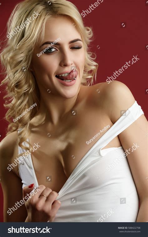Sexy Blonde Sticking Out Her Tongue Stock Photo Shutterstock