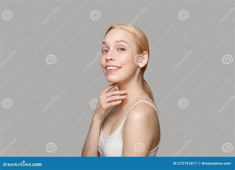 Beautiful Blonde Woman With Ponytail Smiling Isolated On Grey Beauty Cosmetics Skincare Stock