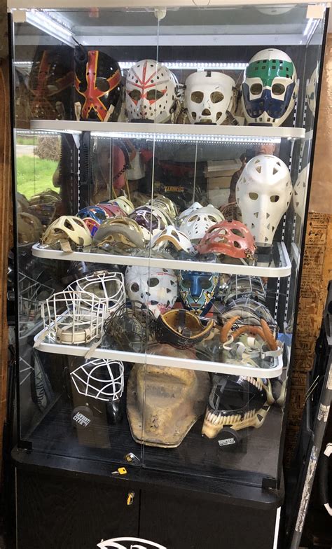 My New Display Case With Some Of My Masks