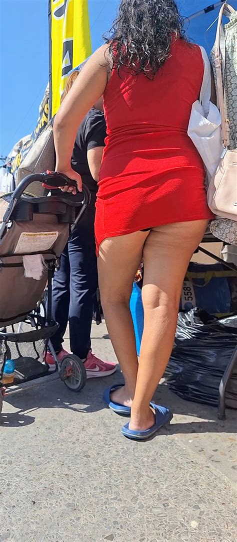 Shameless Milf Latina In A Very Short Red Dress Showing Off Her Cheeks I Appreciate It Oc
