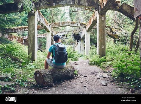 Man Sitting On Tree Stump Hi Res Stock Photography And Images Alamy