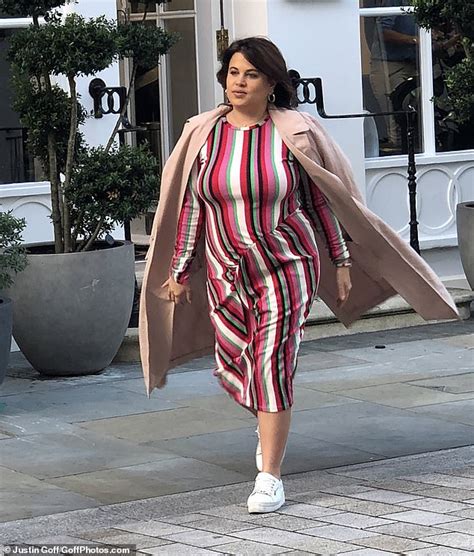 Pregnant Nadia Essex Displays Her Bump In Chic Striped Dress And Reveals Her New Brunette Locks