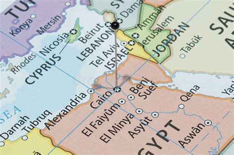Close Up To A Cairo City With A Black Pin Needle Into Egypt Map Stock