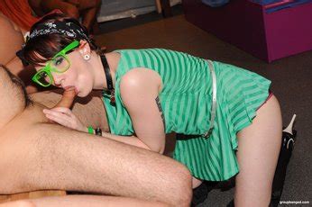Geeky Babe Licks GangBang CUM Off Her Glasses 10 Photos