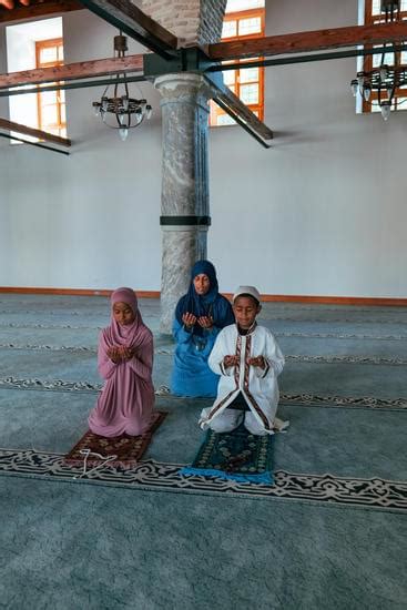 Muslim Family Praying Together - Photos by Canva