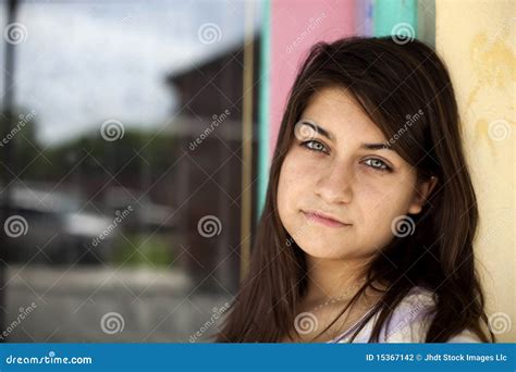 Beautiful Brunette With Piercing Eyes Stock Photo Image Of Wall Unusual