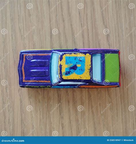 Top View Of An Old Blue Mattel Hot Wheels Toy Car On A Wooden Surface Editorial Photography