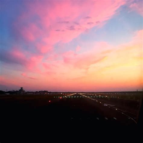 Premium Photo | High angle view of airport runway at sunset