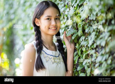 Portrait of charming teenage girl at outdoor Stock Photo - Alamy