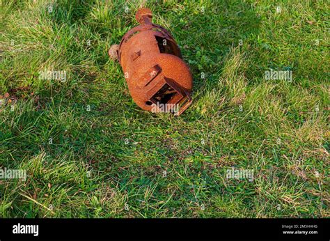 Old Rusted Wood Burner Discarded On The Grass Verge At Tyrella Beach