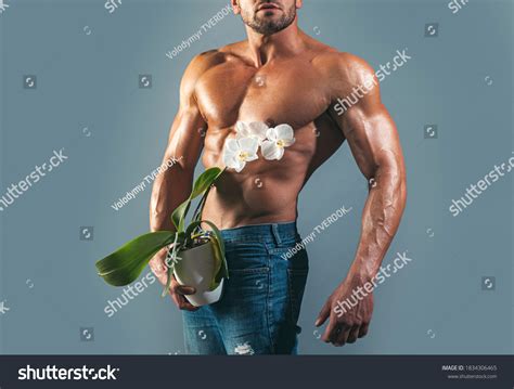 Shirtless Athletic Naked Guy Holds Orchid ภาพสตอก Shutterstock